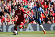 Soccer Football - Premier League - Liverpool vs Brighton & Hove Albion - Anfield, Liverpool, Britain - May 13, 2018 Liverpool's Mohamed Salah in action with Brighton's Gaetan Bong Action Images via Reuters/Carl Recine