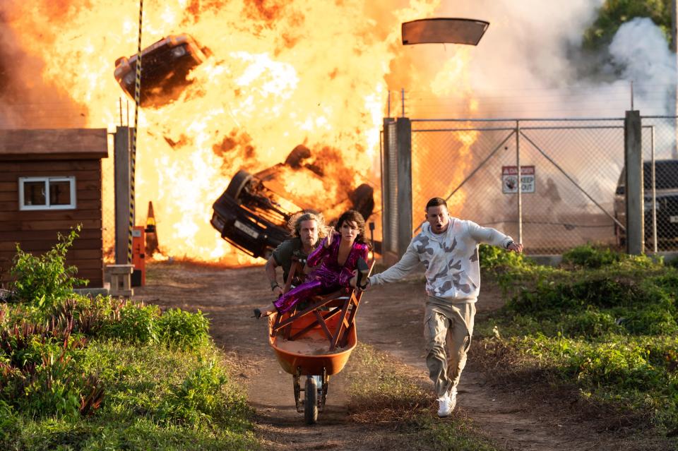 Jack (Brad Pitt, from left), Loretta (Sandra Bullock) and Alan (Channing Tatum) escape certain doom in "The Lost City."