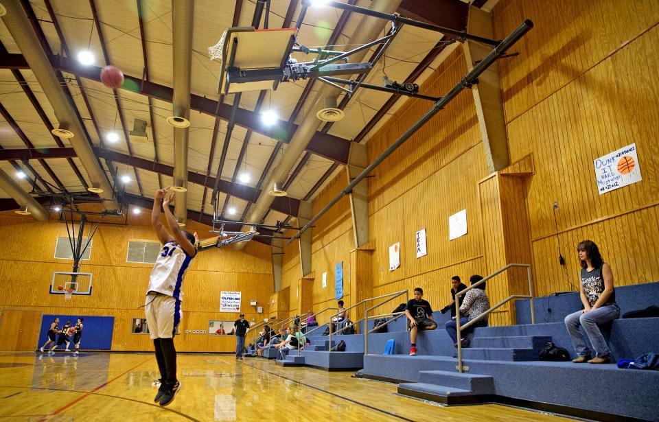 Fans occupying the stands in the Olfen school gym wait for the game to start Friday, Jan. 24, 2020.