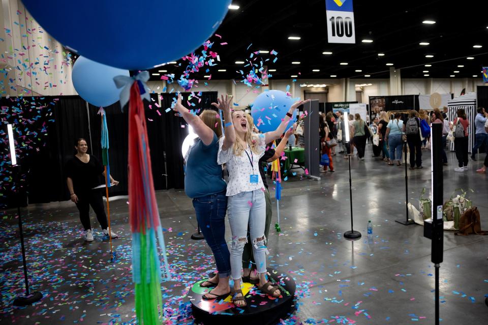 Sandie Barnes, center left, Cara Hansen, center right, and Cheryl Dalby, back, teachers at Belmont Elementary in Lehi, take a 360 selfie at the Show Up for Teachers Conference at the Mountain America Expo Center in Sandy on Wednesday, July 19, 2023. | Spenser Heaps, Deseret News