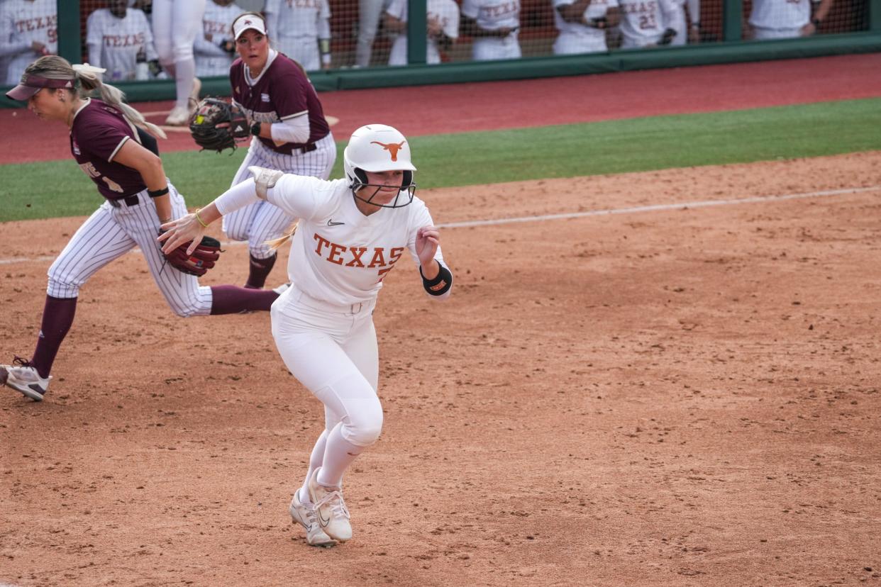 Texas outfielder Ashton Maloney runs to first base in the Longhorns' win over Texas State at McCombs Field last week. Texas won all four of its games last week while becoming the consensus No. 1 team in the nation.