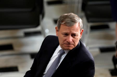 FILE PHOTO: Chief Justice of the Supreme Court John Roberts attends a memorial for former House Minority Leader Bob Michel at the Capitol Building