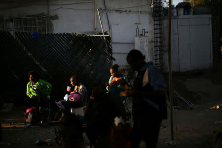 Haitian migrants eat inside Padre Chava shelter after leaving Brazil, where they sought refuge after Haiti's 2010 earthquake, but are now attempting to enter the U.S., in Tijuana, Mexico, October 3, 2016. REUTERS/Edgard Garrido