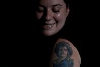 The Wider Image: Argentines celebrate 'eternal love' for Maradona with tattoos