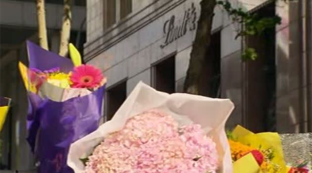 Floral tributes for victims Katrina Dawson and Tori Johnson. Photo: 7News