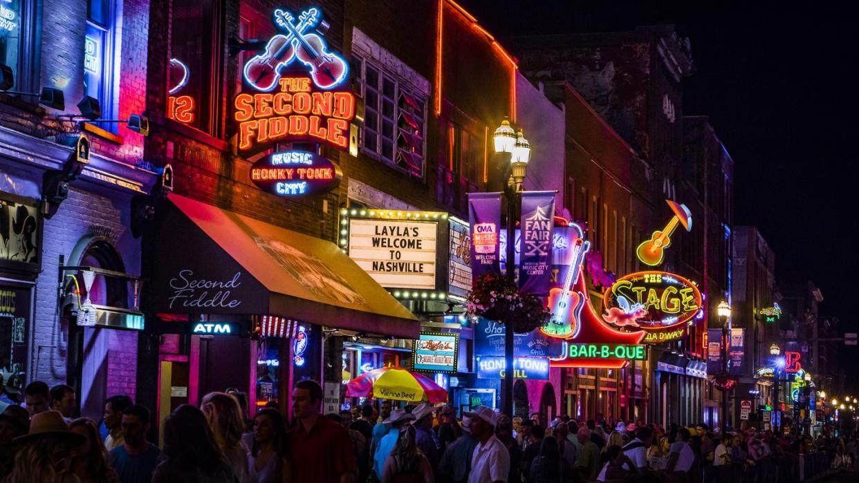 neon signs on lower broadway nashville at night