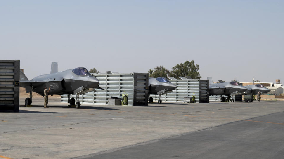 In this handout photo from the U.S. Air Force, U.S. Air Force F-35A Lightning II fighter jets stand parked at an undisclosed location in the Middle East on July 25, 2023. Thousands of Marines backed by the United States' top fighter jets, warships, and other aircraft are slowly building up in the Persian Gulf. It's a sign that while America's wars in the region may be over, its conflict with Iran over its advancing nuclear program only worsens with no solutions. (Staff Sgt. Christopher Sommers/U.S. Air Force, via AP)