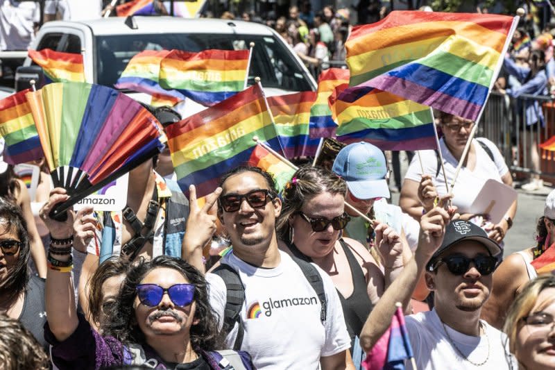 Participants from Amazon march up Market Street during the San Francisco Pride Parade in San Francisco on Sunday. Tens of thousands turned out for the annual event. Photo by Terry Schmitt/UPI