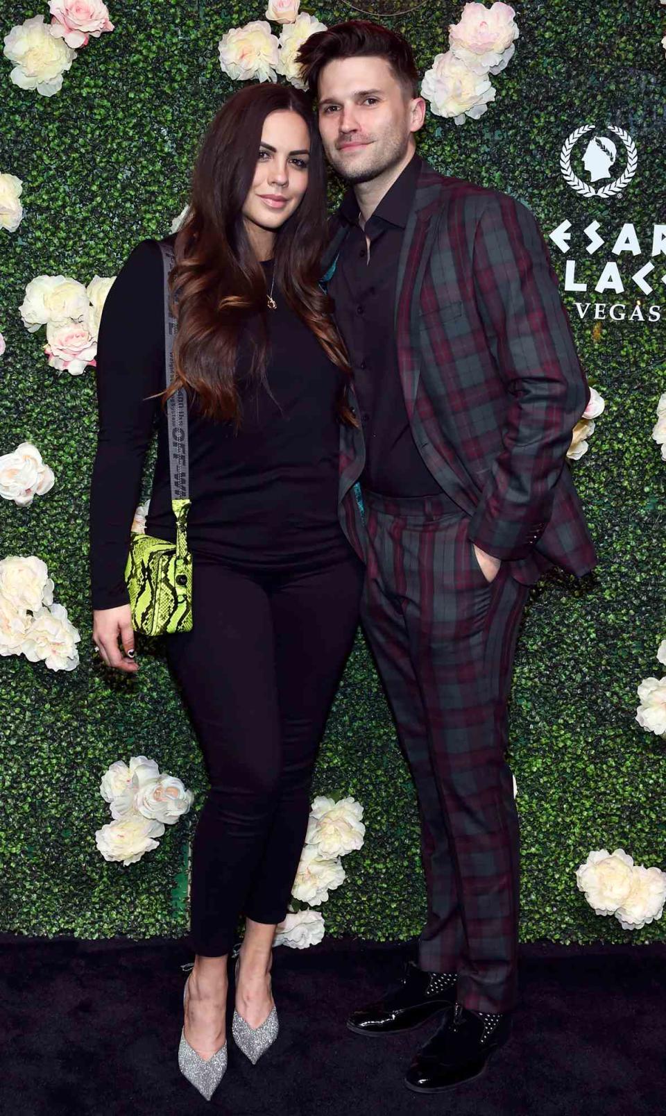 Katie Maloney (L) and Tom Schwartz attend the grand opening of Vanderpump Cocktail Garden at Caesars Palace on March 30, 2019 in Las Vegas, Nevada