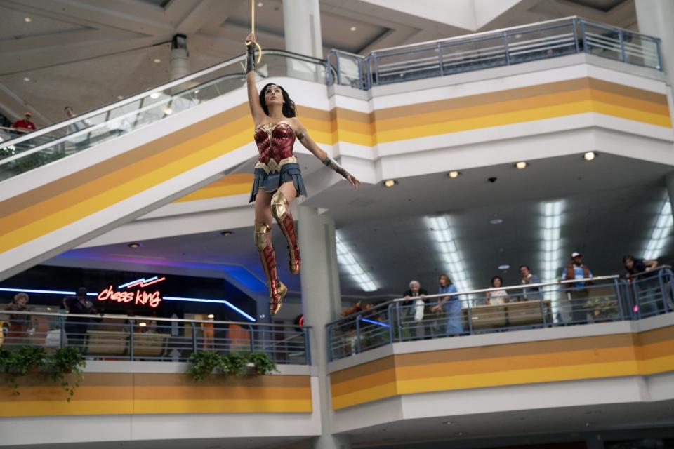 Gal Gadot flies through a mall