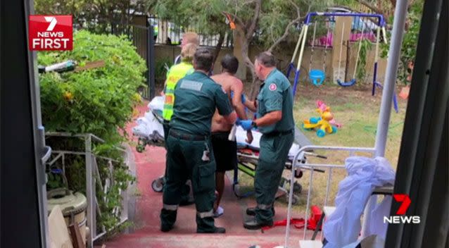 Slumped and bleeding after a car ran over him, a witness found the injured man on a chair in his front yard. Source: 7 News