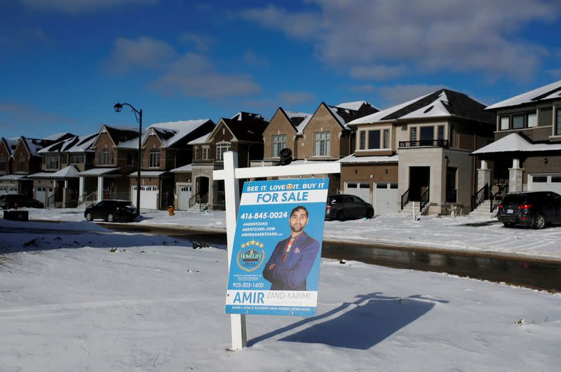 FILE PHOTO: A real estate for sale sign is seen in a subdivision in East Gwillimbury, Ontario