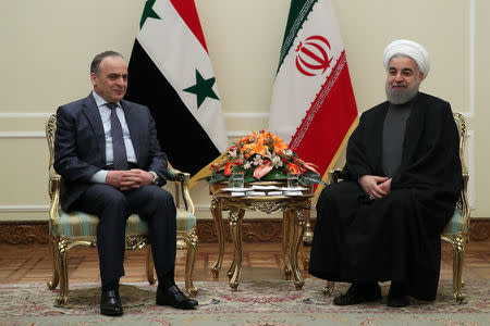 Iran's President Hassan Rouhani meets with Syrian Prime Minister Emad Khamis in Tehran, Iran January 18, 2017. Picture taken January 18, 2017. President.ir/Handout via REUTERS