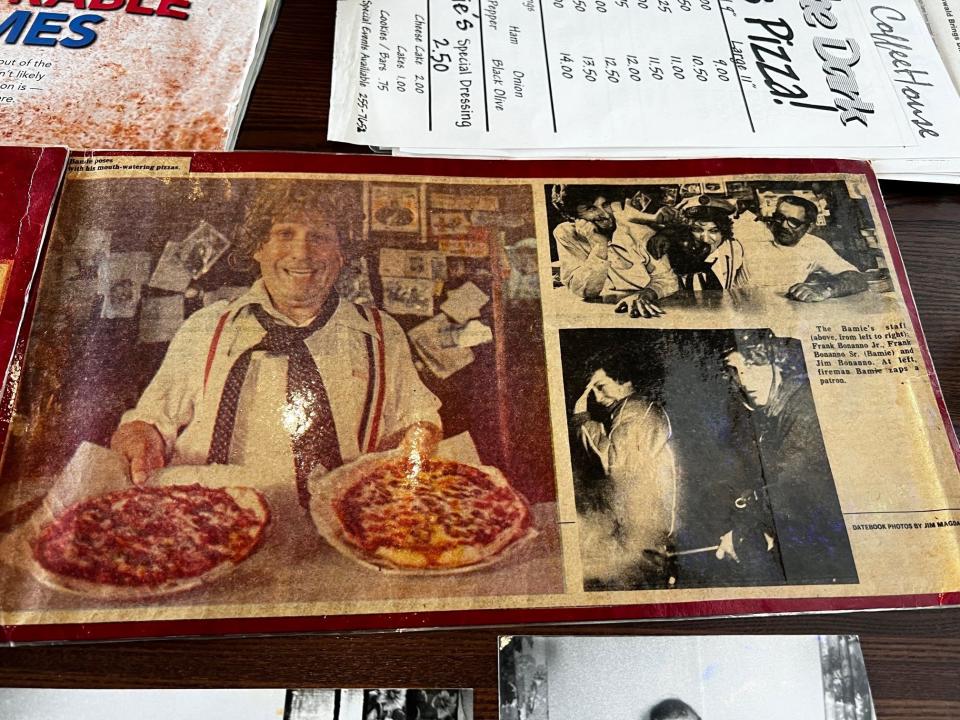 Photos such as this one of Frank "Bamie" Bonanno, left, and an old menu are among the memorabilia Ron and Ann Bonanno brought to display at Gusto Pizza Bar. Ron's father Frank and mother Colleen, aka Bamie and Coke, ran Bamie's Pizza House on the southside of Des Moines for 23 years.