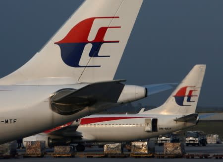 FILE PHOTO: Malaysia Airlines planes sit on the tarmac at Kuala Lumpur International Airport