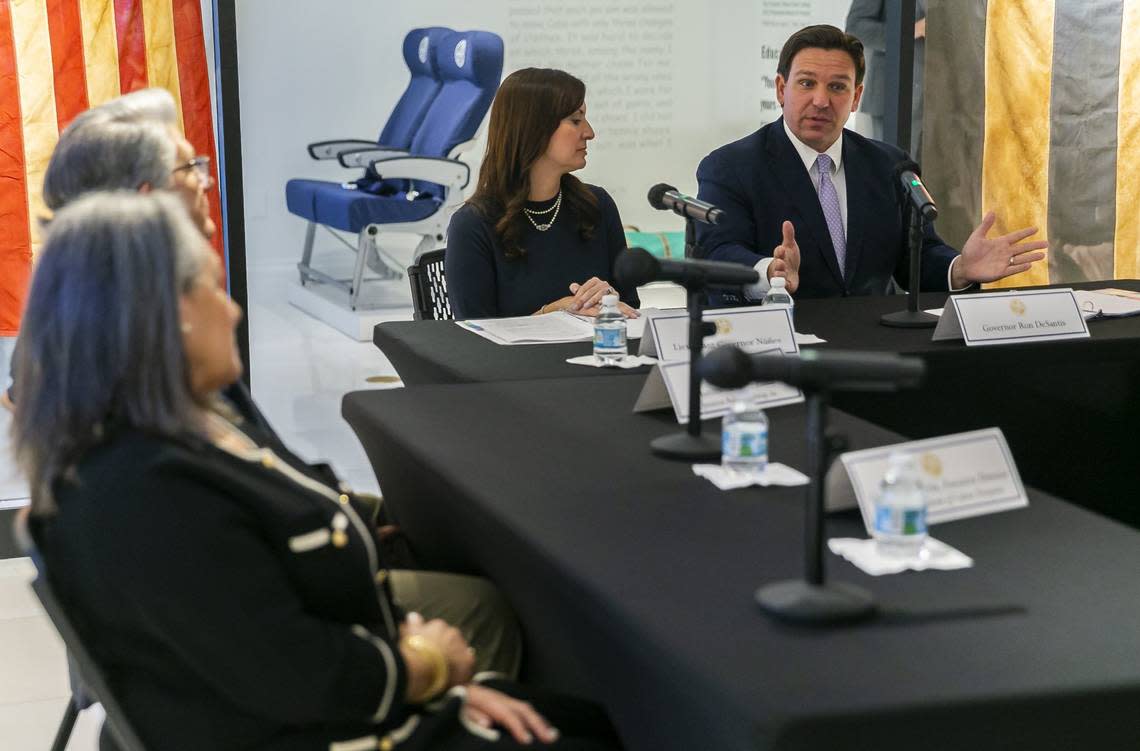 Governor Ron DeSantis, far-right, and Lieutenant Governor Jeanette Nuñez, left of DeSantis, attend a roundtable discussion at the American Museum of the Cuban Diaspora in Miami’s Coral Way neighborhood on Monday, February 7, 2022.