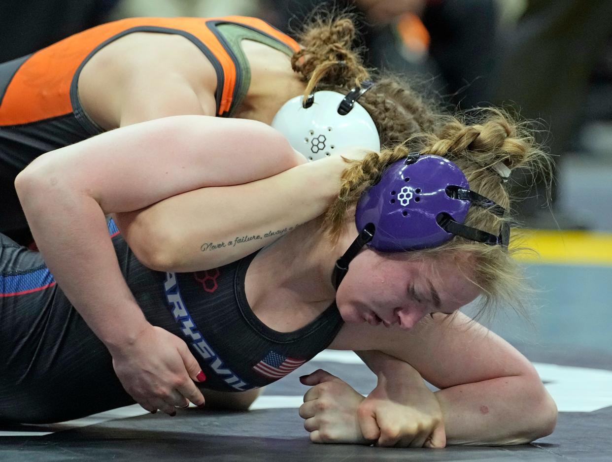 Mar 10, 2024; Columbus, Ohio, USA; Marysville's Cami Leng wrestles Gibsonburg junior Morgan Leonhardt in the 115 weight class during the Ohio State Wrestling Final round at Value City Arena.