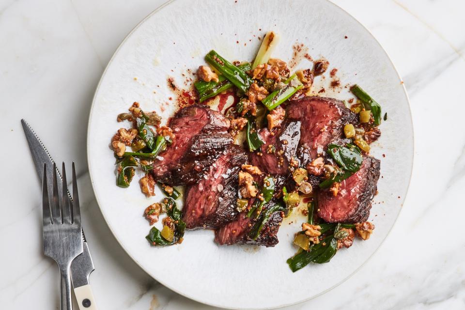 <h1 class="title">Hanger Steak with Charred Scallion Sauce</h1><cite class="credit">Photo by Chelsie Craig, Prop Styling by Emily Eisen, Food Styling by Molly Baz</cite>