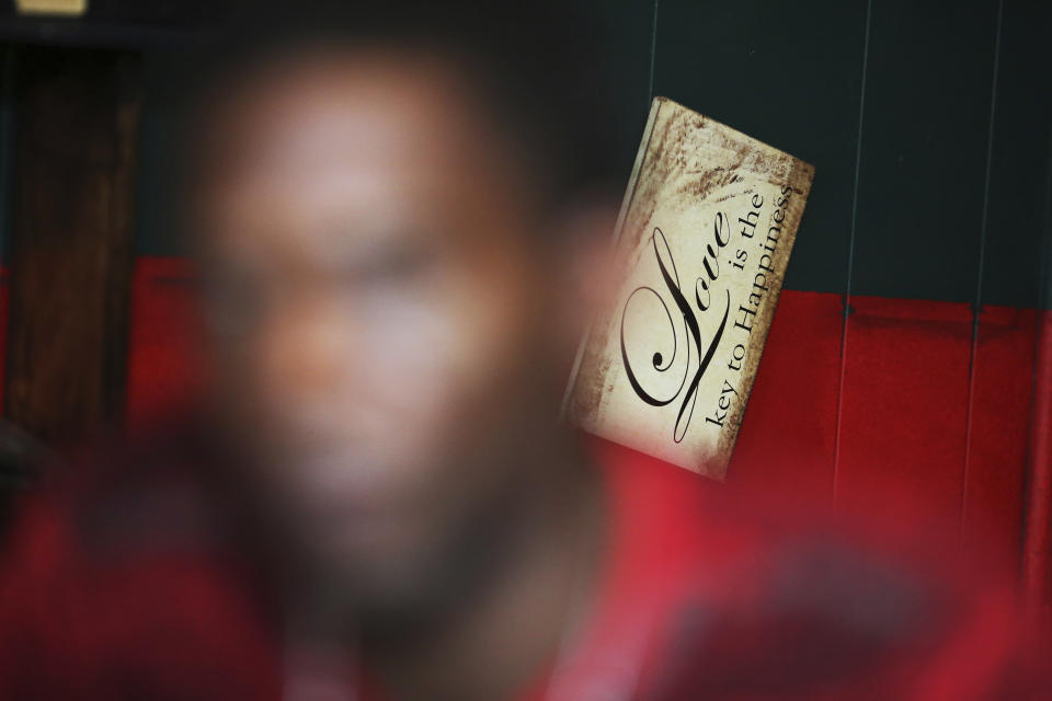 Joshua K. Love sits in the living room of his home in Greenwood, Miss., Saturday, June 8, 2019. Love says he was sexually abused by two Franciscan friars at the St. Francis of Assisi School. (AP Photo/Wong Maye-E)