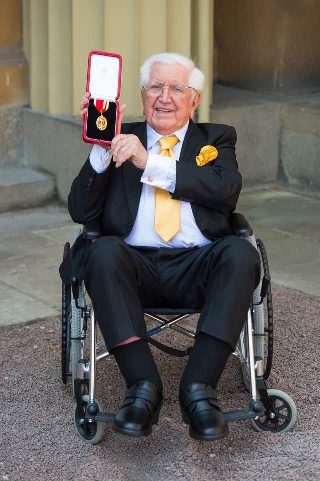 Sir Jack Petchey in a wheelchair