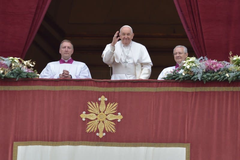 Pope Francis offers blessings to the thousands gathered in the square. Photo by Stefano Spaziani/UPI