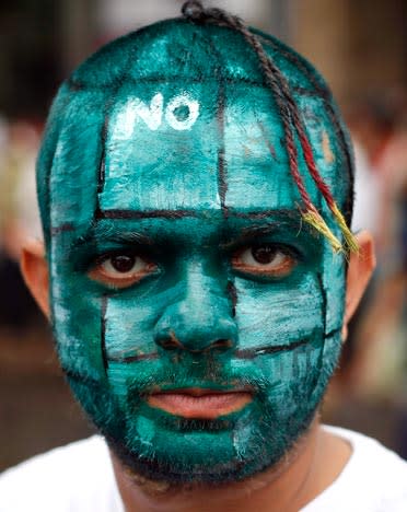 Student Mihir Joshi, with a painted face depicting a hand grenade, participates in a peace rally in Mumbai August 6, 2011, to mark the 66th anniversary of the world's first atomic attack on Hiroshima, Japan. REUTERS/Danish Siddiqui