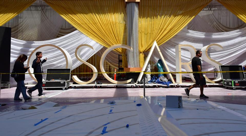 TOPSHOT - Preparations for the 94th Oscars red carpet arrivals area continue along Hollywood Boulevard in Hollywood, California on March 24, 2022. (Photo by Frederic J. BROWN / AFP) (Photo by FREDERIC J. BROWN/AFP via Getty Images)