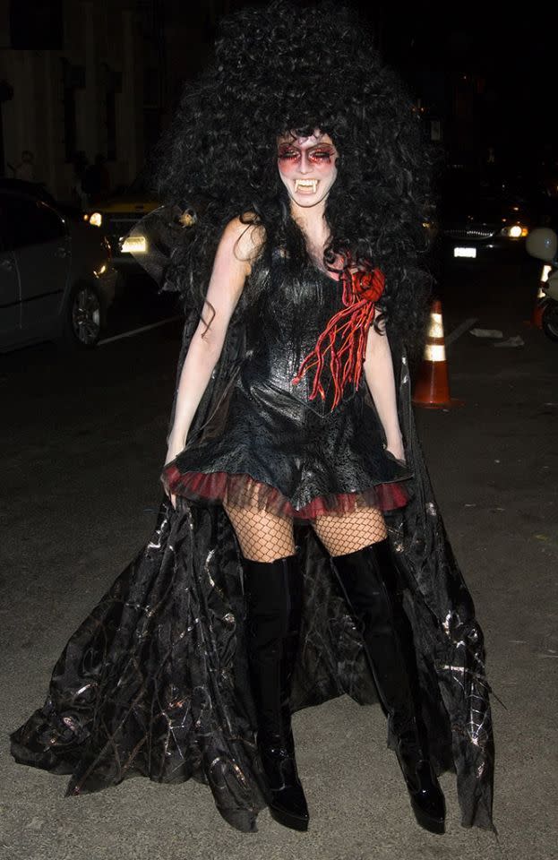 <p>No. 14: Klum was ready to suck some blood in 2005. Her fanged vampire costume was big and bold, from the huge curly black wig to the giant wings. An added touch was the exposed heart. The only thing was, it wasn’t all that different from her witch outfit the year before — that too centered around a giant, out-of-control wig — making it less of a standout. (Photo: Lawrence Lucier/FilmMagic) </p>
