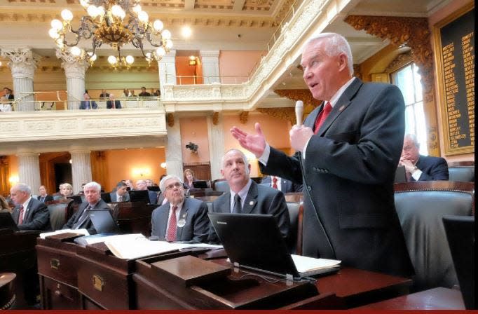 Rep. Bill Dean, R-Xenia, speaks to the Ohio House. He is the sponsor of a new bill that would slash absentee and early voting in what Democrats say is an attempt at voter suppression.