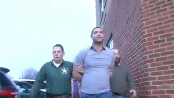 PHOTO: Officers from the East Palestine Police Department in Ohio arrested NewsNation reporter Evan Lambert during a press conference on Wednesday, Feb. 8, 2023, about the cleanup efforts following a train derailment in a small Ohio village. (Jordan Miller News)