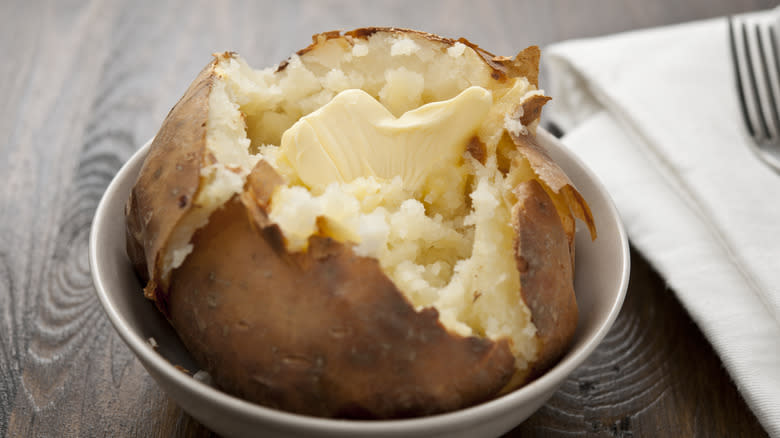 Baked potatoes with butter