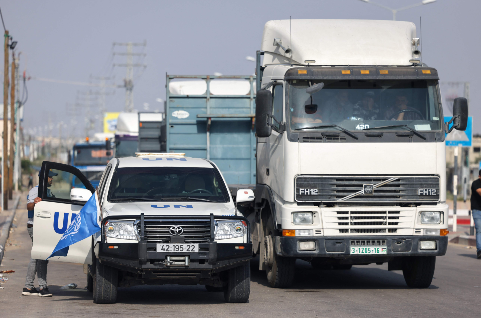 Empty trucks wait for aid at the Rafah crossing on Sunday (AFP via Getty Images)