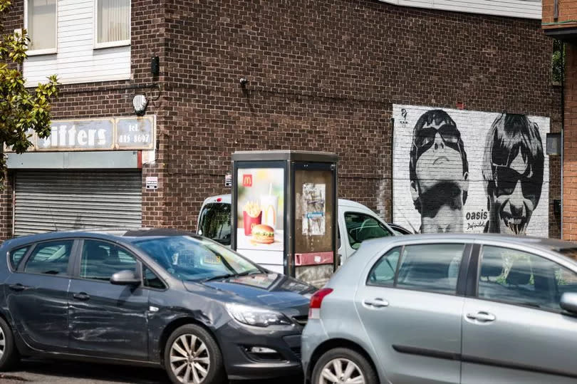 A new mural of the Oasis brothers has appeared on the side of the Sifters record store