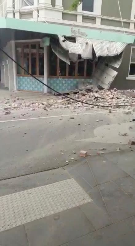 Debris and a damaged building are seen in Prahran, after a magnitude 6.0 earthquake struck near Melbourne, Victoria, Australia