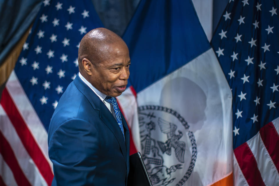 New York City Mayor Eric Adams, exits the chamber after taking part in a news conference at City Hall in New York, Tuesday, March 19, 2024. (AP Photo/Eduardo Munoz Alvarez)