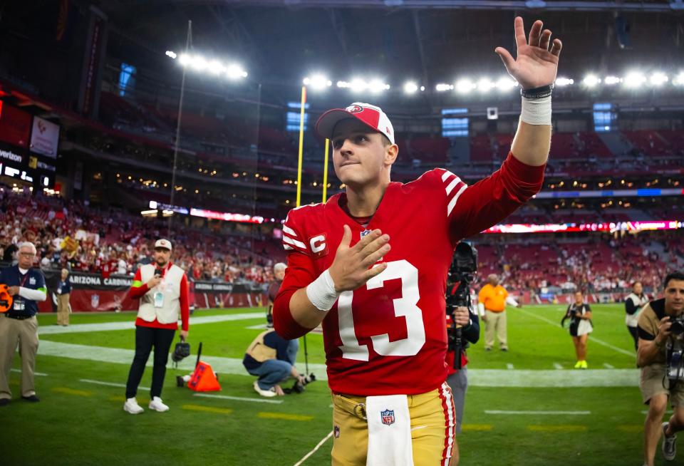 Dec 17, 2023; Glendale, Arizona, USA; San Francisco 49ers quarterback Brock Purdy (13) celebrates following the game against the Arizona Cardinals at State Farm Stadium.