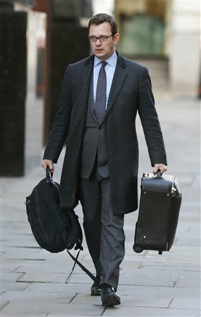 Former News of the World editor Andy Coulson arrives at the Old Bailey courthouse in London January 28, 2014. REUTERS/Suzanne Plunkett