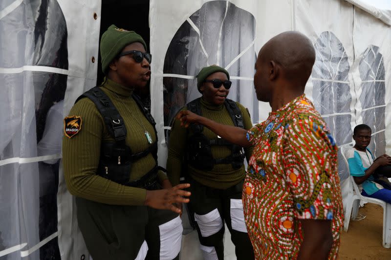 The Wider Image: Nigeria's female bouncers show their strength fighting stereotypes