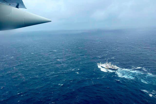<p>U.S. Coast Guard via AP</p> Rescuers search for the lost Titan submersible