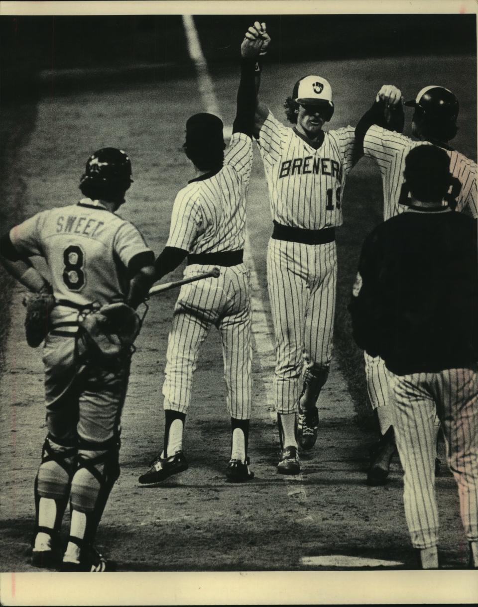 Robin Yount was congratulated after he had hit his game-winning home run to lead off the bottom of the 10th inning Monday night at County Stadium on Aug. 22, 1983.