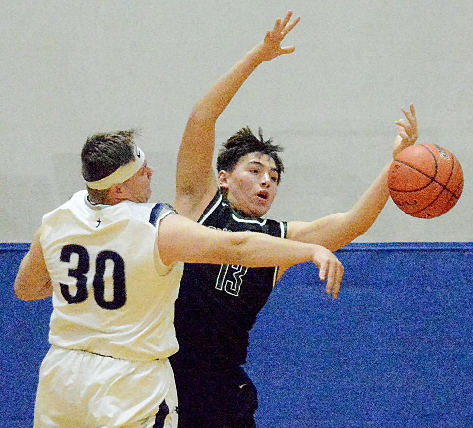 Clark-Willow Lake's Kaplan Felberg (right) erupted for 33 points last week in a season-opening high school boys basketball loss to Sioux Valley.