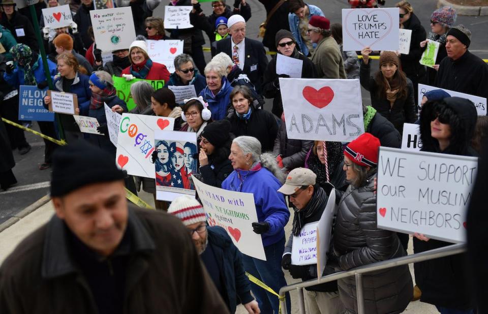 <p>In the wake of President Trump's Muslim ban, residents of Sterling, Virginia showed their solidarity outside a mosque on February 3, 2017.</p>