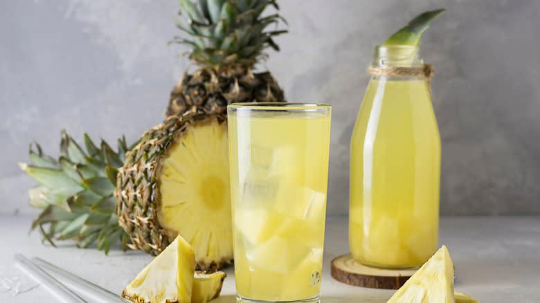 cut pineapple with pineapple juice