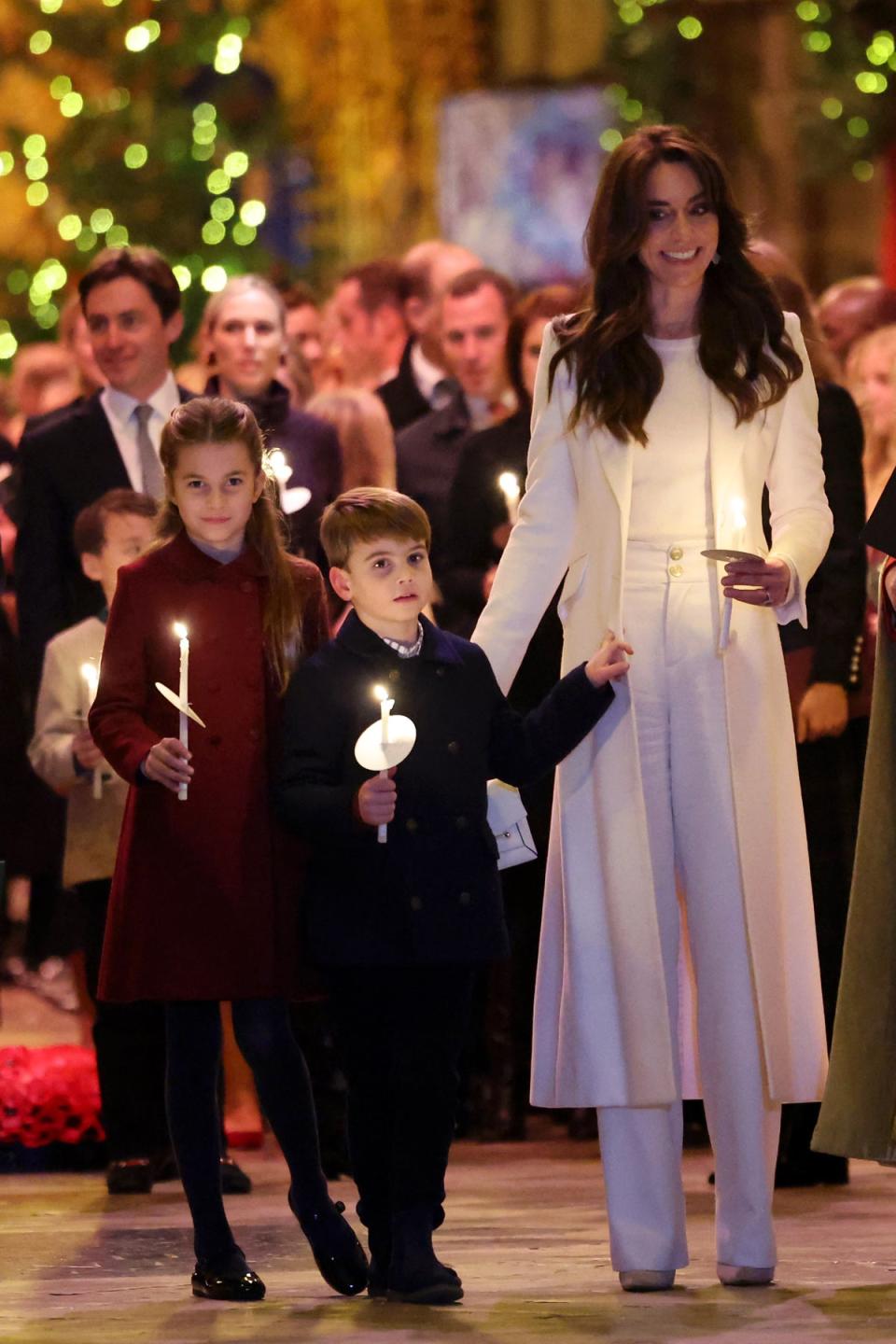 Prince Louis and Princess Charlotte dutifully hold candles at their mother’s event (Chris Jackson/PA Wire)