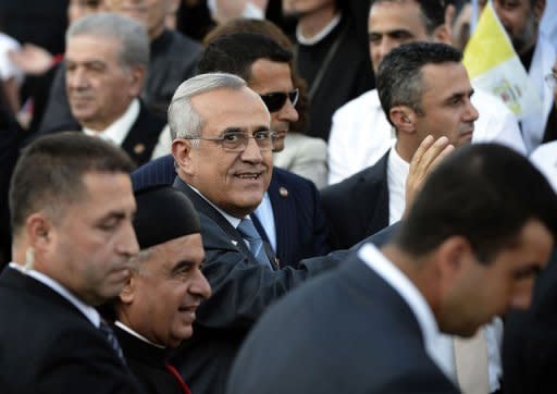 Lebanese President Michel Sleiman (C) arrives to attend a ceremony led by Pope Benedict XVI in the Lebanese mountain village of Bkerke