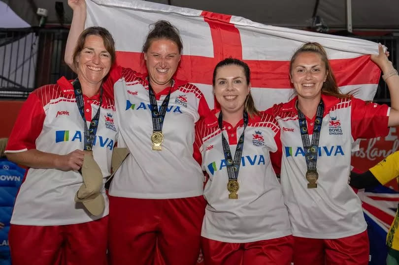 Amy, left, with her teammates after their big win