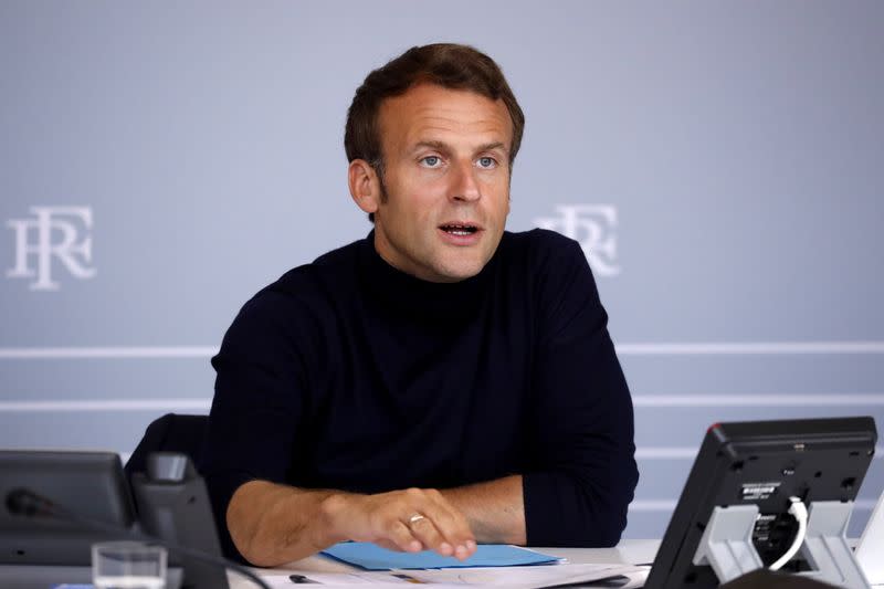 FILE PHOTO: French President Macron attends a video conference with representatives of the overseas territories