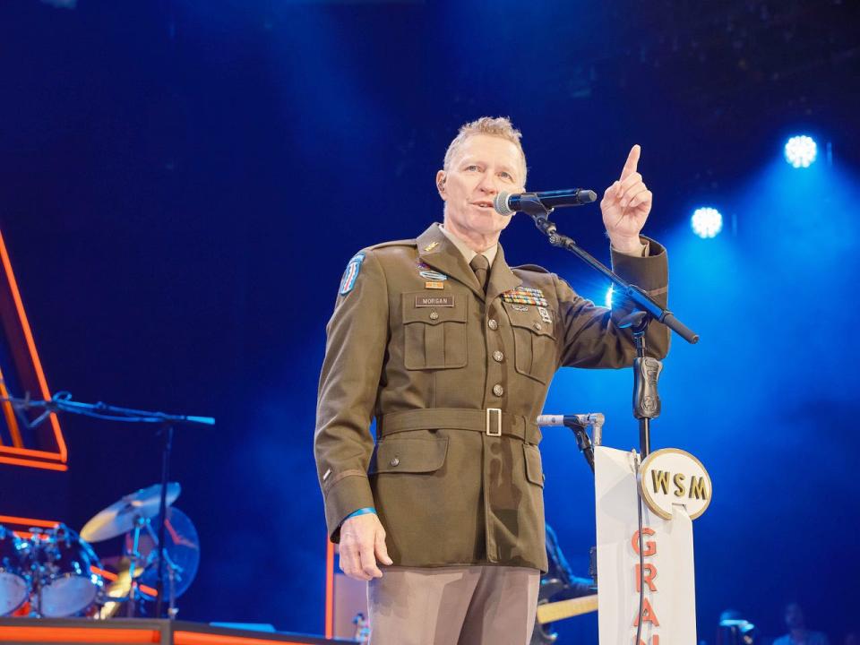 County music star Craig Morgan talks to the audience at the Grand Ole Opry during a performance on July 29, 2023, when he surprised the crowd and was sworn into the U.S. Army Reserve. Morgan previously served 17 years in the Army and Army Reserve with the 101st and 82nd Airborne divisions.