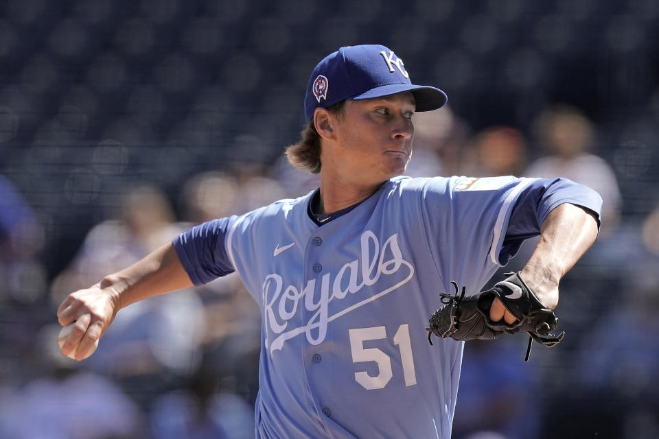 Kansas City Royals starting pitcher Brady Singer throws during the first inning of a baseball game against the Kansas City Royals Sunday, Sept. 11, 2022, in Kansas City, Mo. (AP Photo/Charlie Riedel)