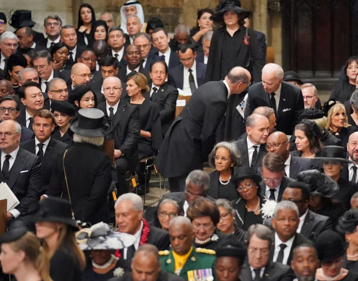 President Joe Biden takes his seat with wife Jill Biden, other heads of state and dignitaries, at the State Funeral of Queen Elizabeth II, held at Westminster Abbey, London.<span class="copyright">Dominic Lipinski—Pool/Reuters</span>